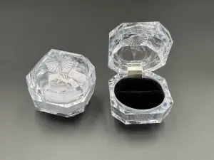 Radiant Clarity: Gem-Cut Acrylic Ring Cases for High-Impact Showcase Displays