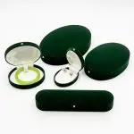 Curved Luxury: Oval Plush Velvet Jewelry Presentation Cases for Heritage Collections