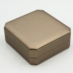Elevate Your Brand Experience with Custom Octagonal Champagne Bronze Leather Jewelry Boxes
