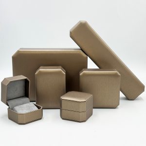 Elevate Your Brand Experience with Custom Octagonal Champagne Bronze Leather Jewelry Boxes