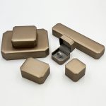Elevate Your Brand Experience with Custom Octagonal Champagne Bronze Leather Jewelry Boxes