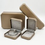 Elevate Your Brand Experience with Custom Octagonal Champagne Bronze Leather Jewelry Boxes